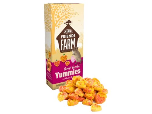 Gerri Gerbil Yummies fra Tiny Friends Farm, velsmagende snacks med ost til gnavere, præsenteret i en farverig pakke med små hjerteformede godbidder.